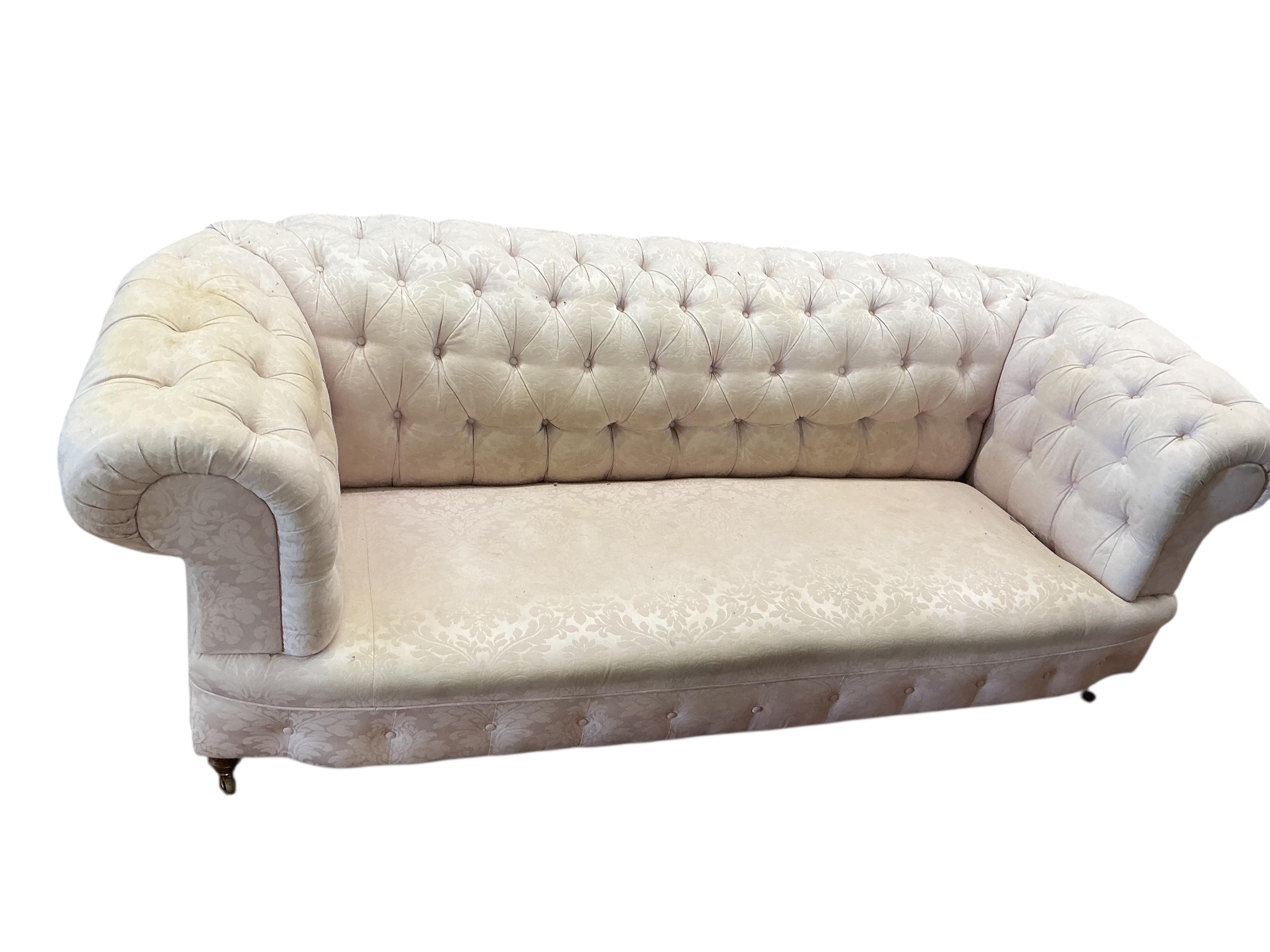 A Victorian deep buttoned Chesterfield settee, width 236cm, depth 91cm, height 84cm